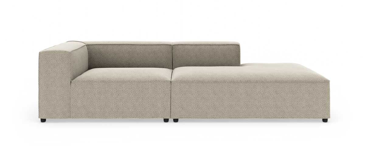 Beige modulsofa med venstre armlæn og højre chaiselong, frontvisning på hvid baggrund.