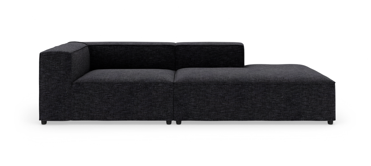 Mørkegrå modulsofa med højre chaiselong set forfra.