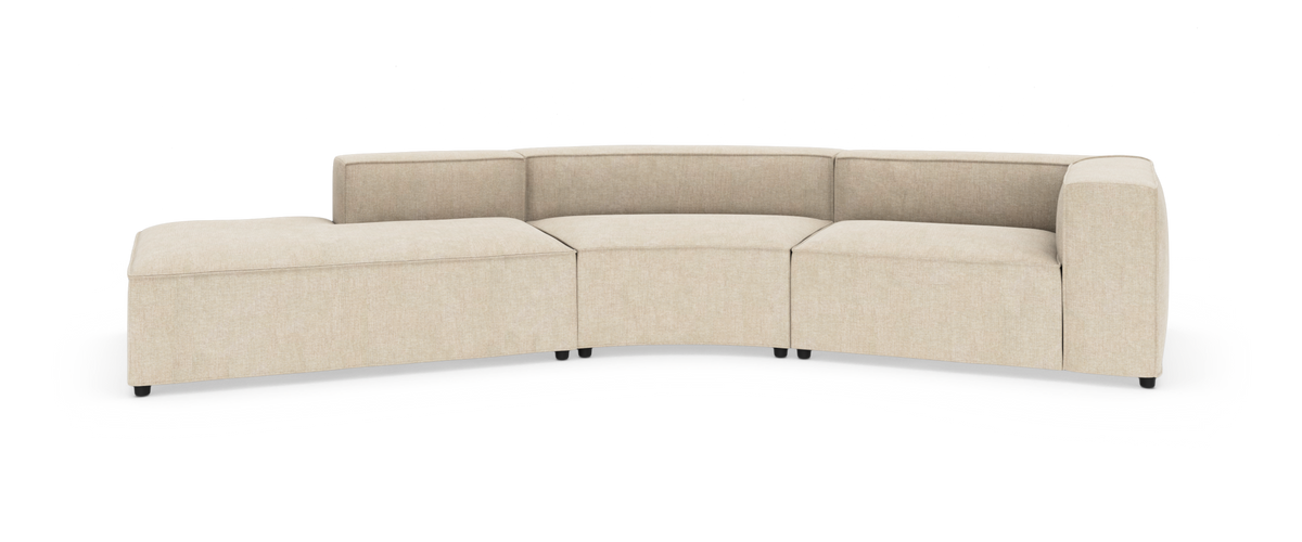 Beige modulsofa med buet form og chaiselong til venstre, isoleret på hvid baggrund.