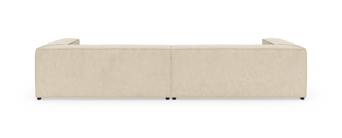 Beige modulsofa set bagfra på hvid baggrund.