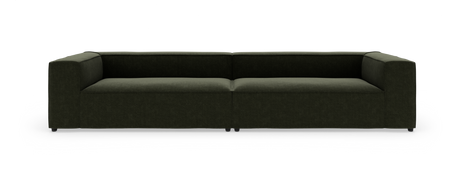 Mørkegrøn, moderne lav modulsofa med firkantede armlæn, fotograferet lige for i studio.
