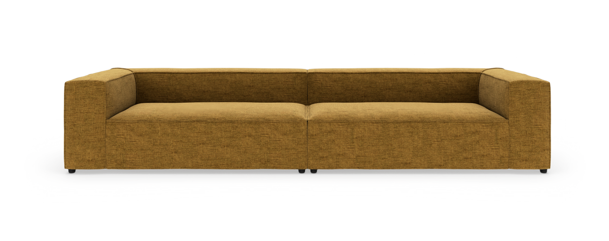 Modulsofa i sennepsgul tekstil på hvid baggrund, set forfra.