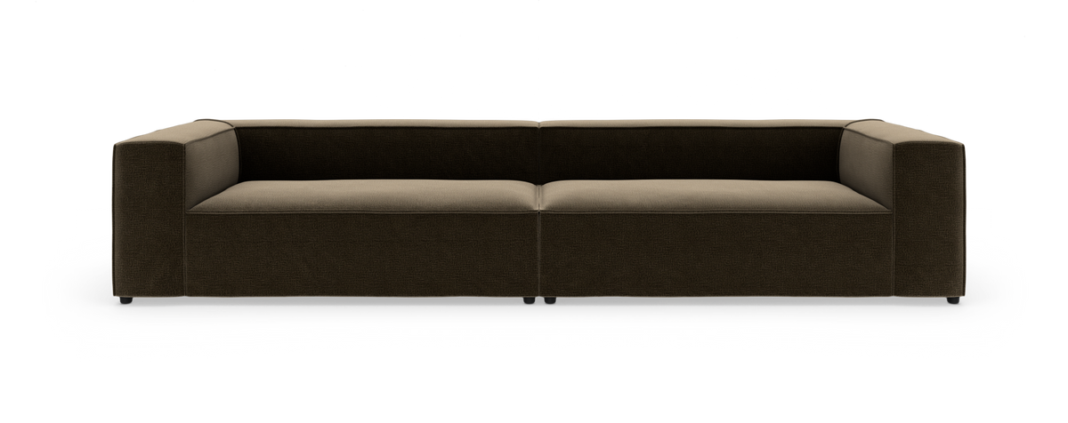 Modulsofa i mørkebrun tekstil med lave armlæn og beige sæde, frilagt på hvid baggrund.