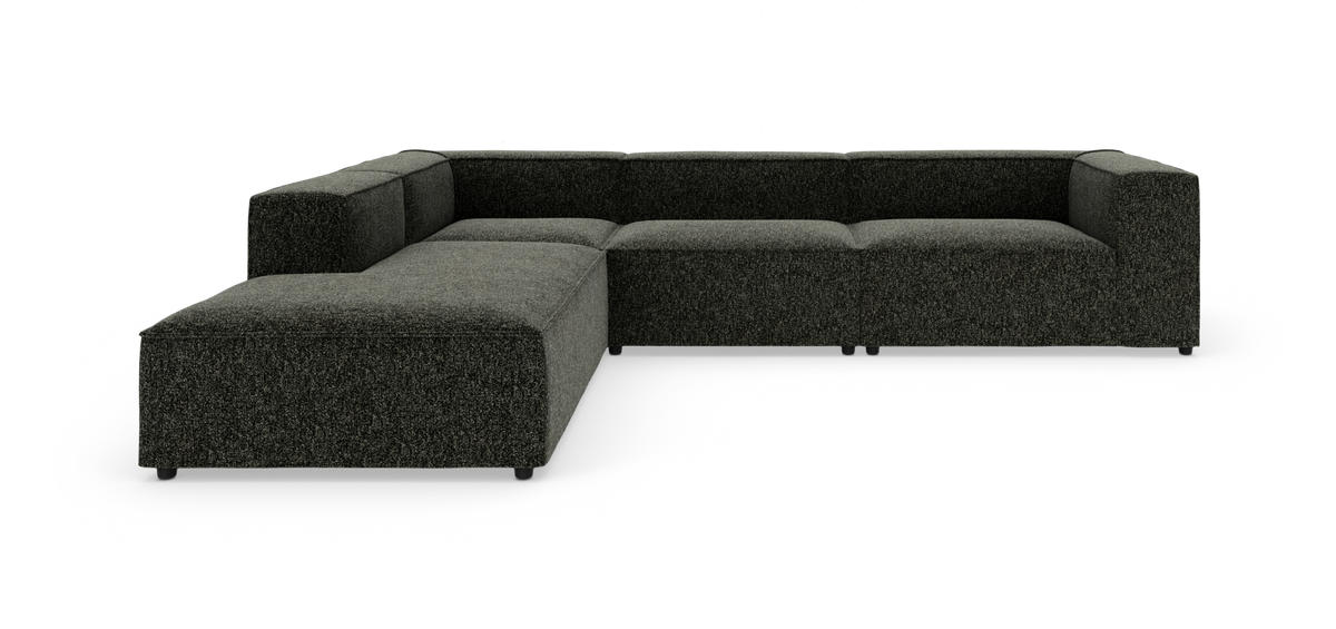Mørkegrå modulær L‑formet hjørnesofa i stof på hvid studiobaggrund.