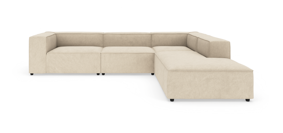 Beige modulsofa i L-form på hvid baggrund.