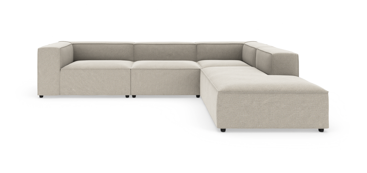 Beige L-formet modulsofa i moderne, minimalistisk stil på hvid baggrund.