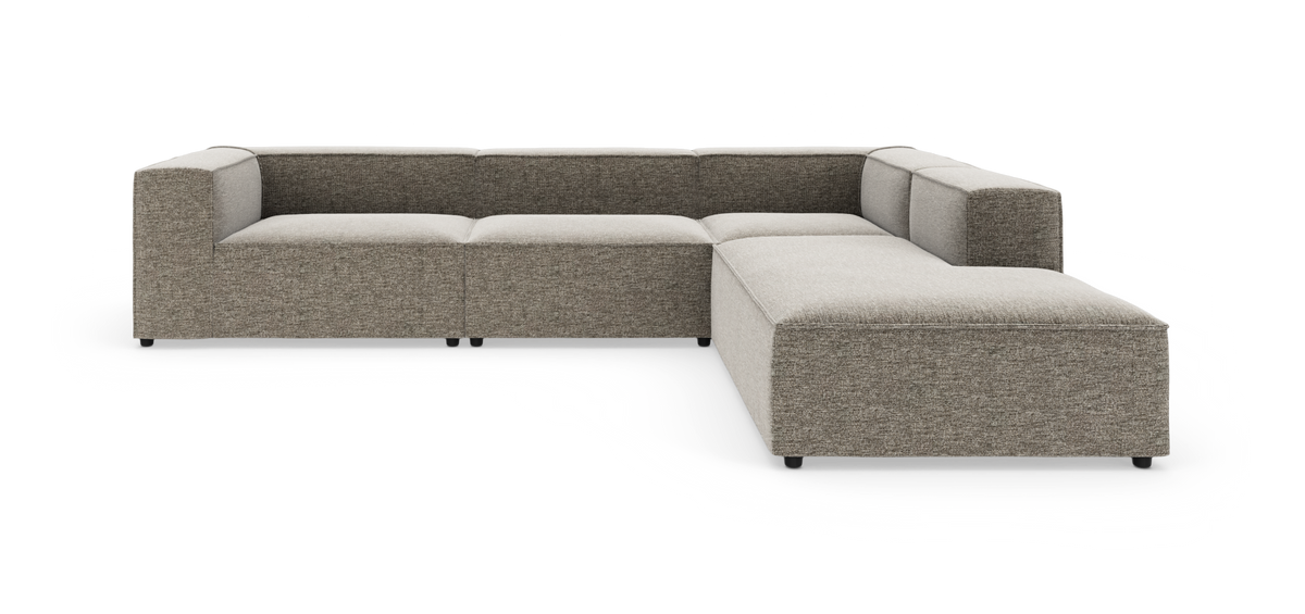 Modulær L-formet sofa i gråbeige stof på hvid frilægning.