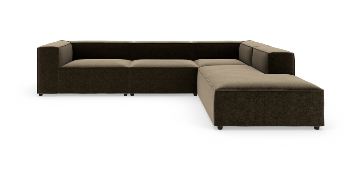 Modulsofa i L‑form med brede armlæn i mørkebrun og beige stof, vist i studieopsætning.