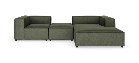 Modulsofa i mørkegrønt stof, L‑form med bred chaiselong, isoleret på hvid baggrund.