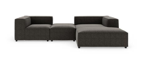Modulær mørkegrå hjørnesofa med chaiselong og midterpuf, frilagt på hvid baggrund.