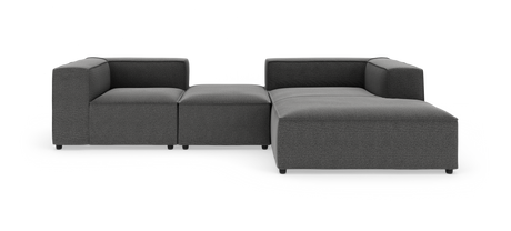 Modulær mørkegrå hjørnesofa i stof på hvid baggrund.
