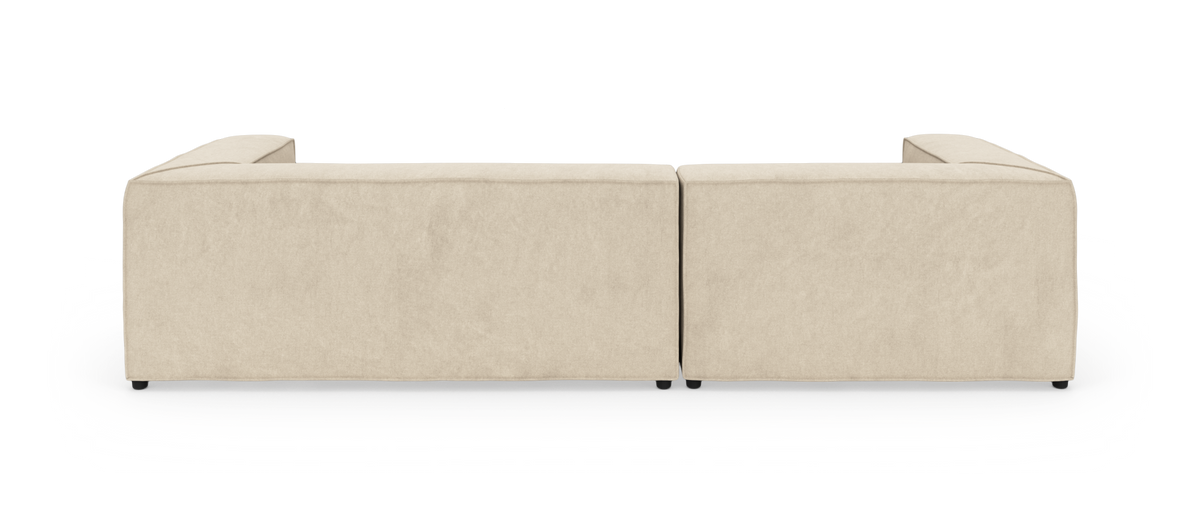 Beige modulsofa set bagfra på hvid baggrund.