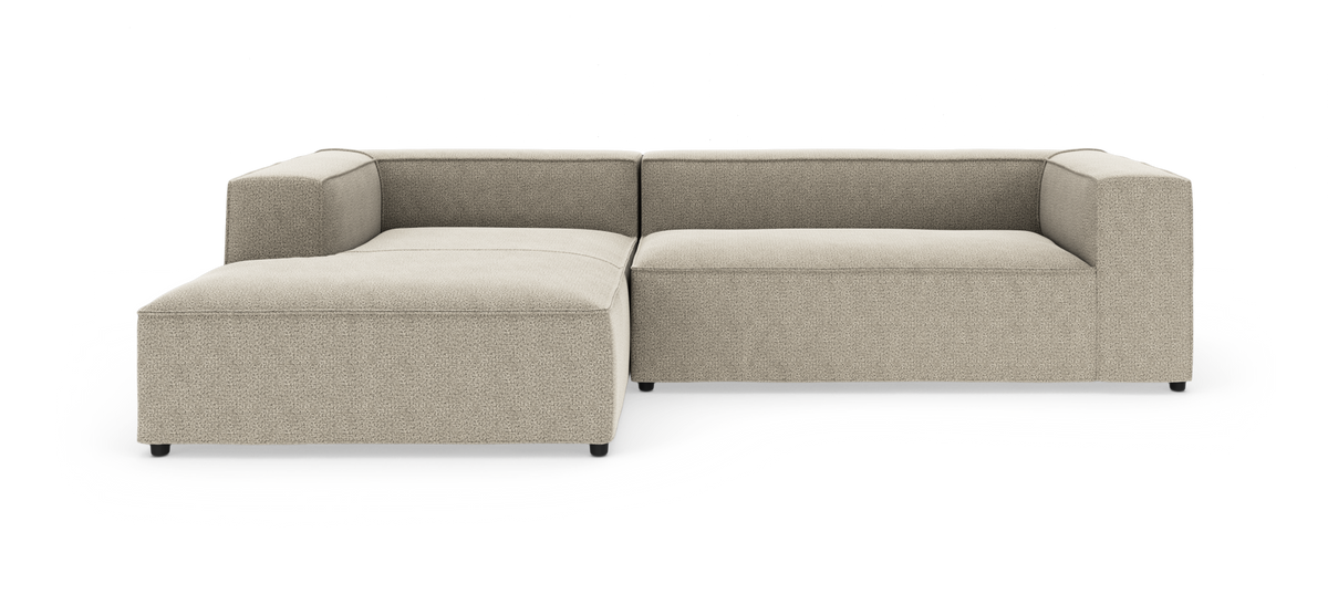Modulsofa i L-form med venstre chaiselong i beige stof, enkel og moderne design.