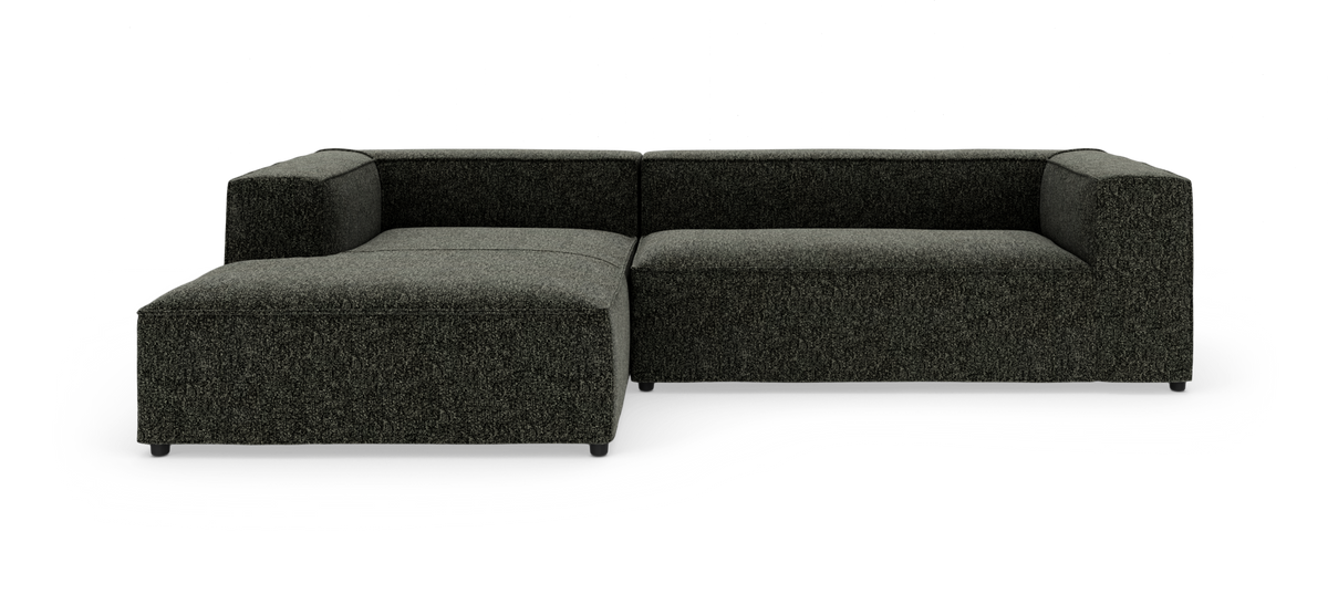 Mørkegrå modulsofa med venstre chaiselong, fotograferet mod hvid baggrund.