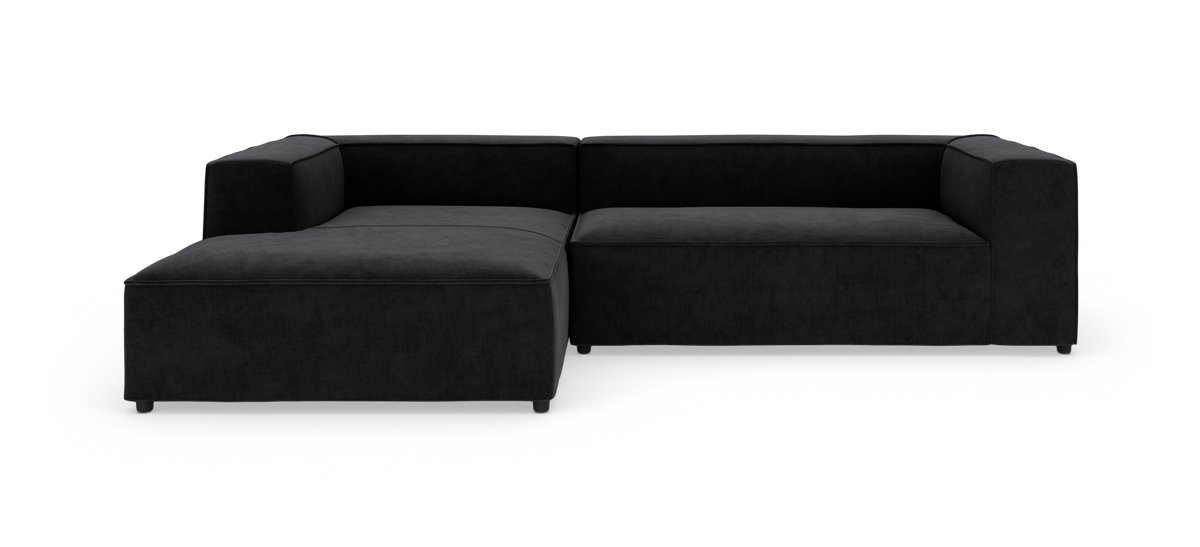 Sort L-formet modulsofa på hvid baggrund.