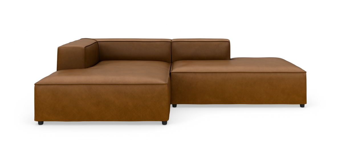 Brun modulsofa i læder med chaiselong, frilagt frontvisning.