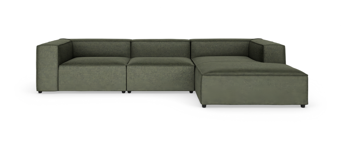 Modulsofa i mørk olivgrøn tekstil med højrevendt chaiselong, vist mod hvid baggrund.