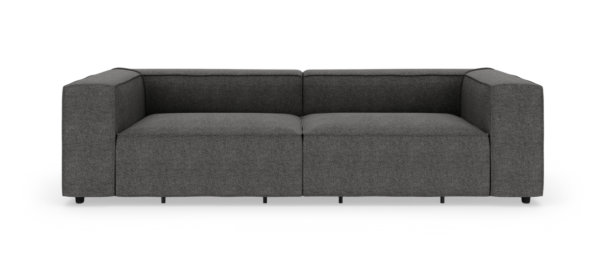 Mørkegrå, moderne 2-personers sofa med tykke armlæn, frilagt på hvid baggrund.