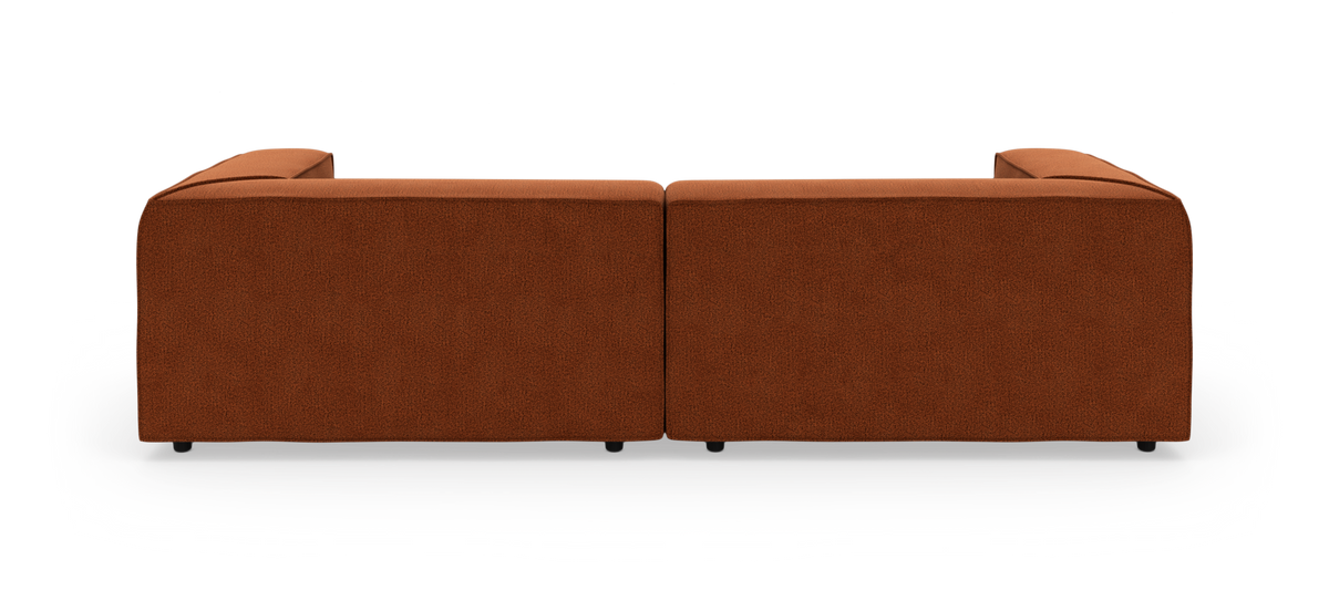 Brun modulsofa set bagfra på hvid studiobaggrund.