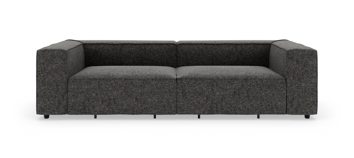 Mørkegrå moderne modulsofa med brede armlæn, frilagt på hvid baggrund.