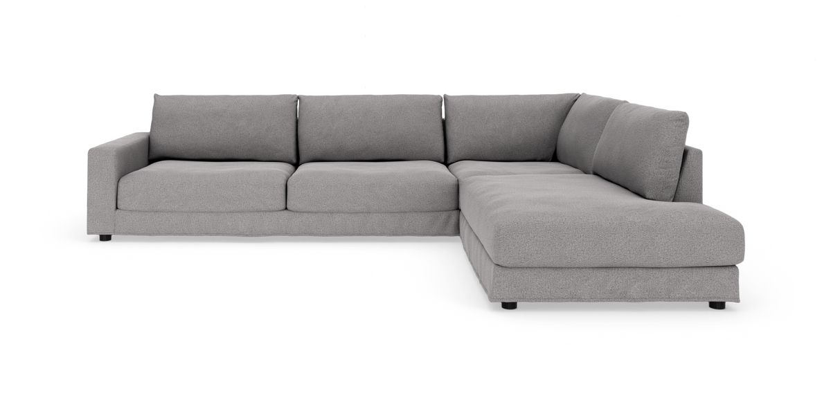 Grå L‑sofa med højrevendt chaiselong, moderne og blød polstring på hvid baggrund.