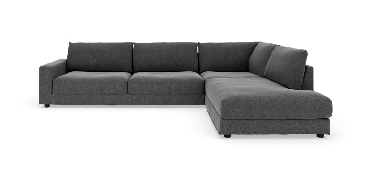 Mørkegrå L‑sofa med højre chaiselong, bløde sædehynder og brede armlæn.
