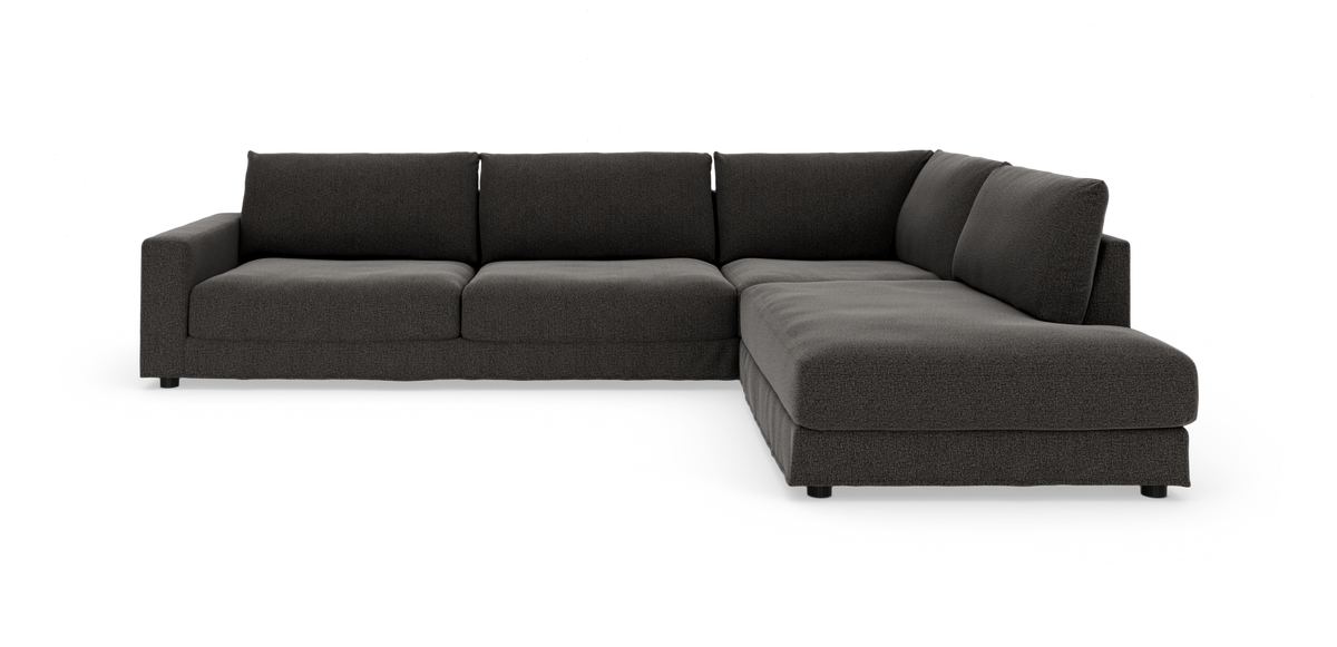 Mørkegrå L‑sofa med chaiselong til højre, fritstående på hvid baggrund.