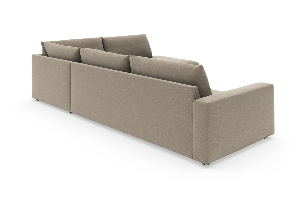 Beige modulsofa set bagfra på hvid baggrund.