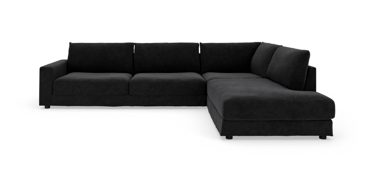 Sort L‑formet modulsofa i studie mod hvid baggrund, set skråt forfra.