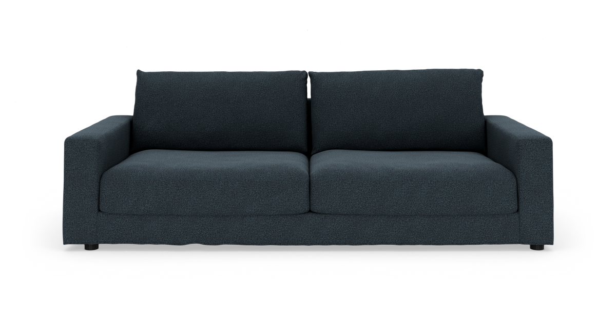 Mørkblå stofsofa med to sæde- og ryghynder, set forfra på hvid baggrund.