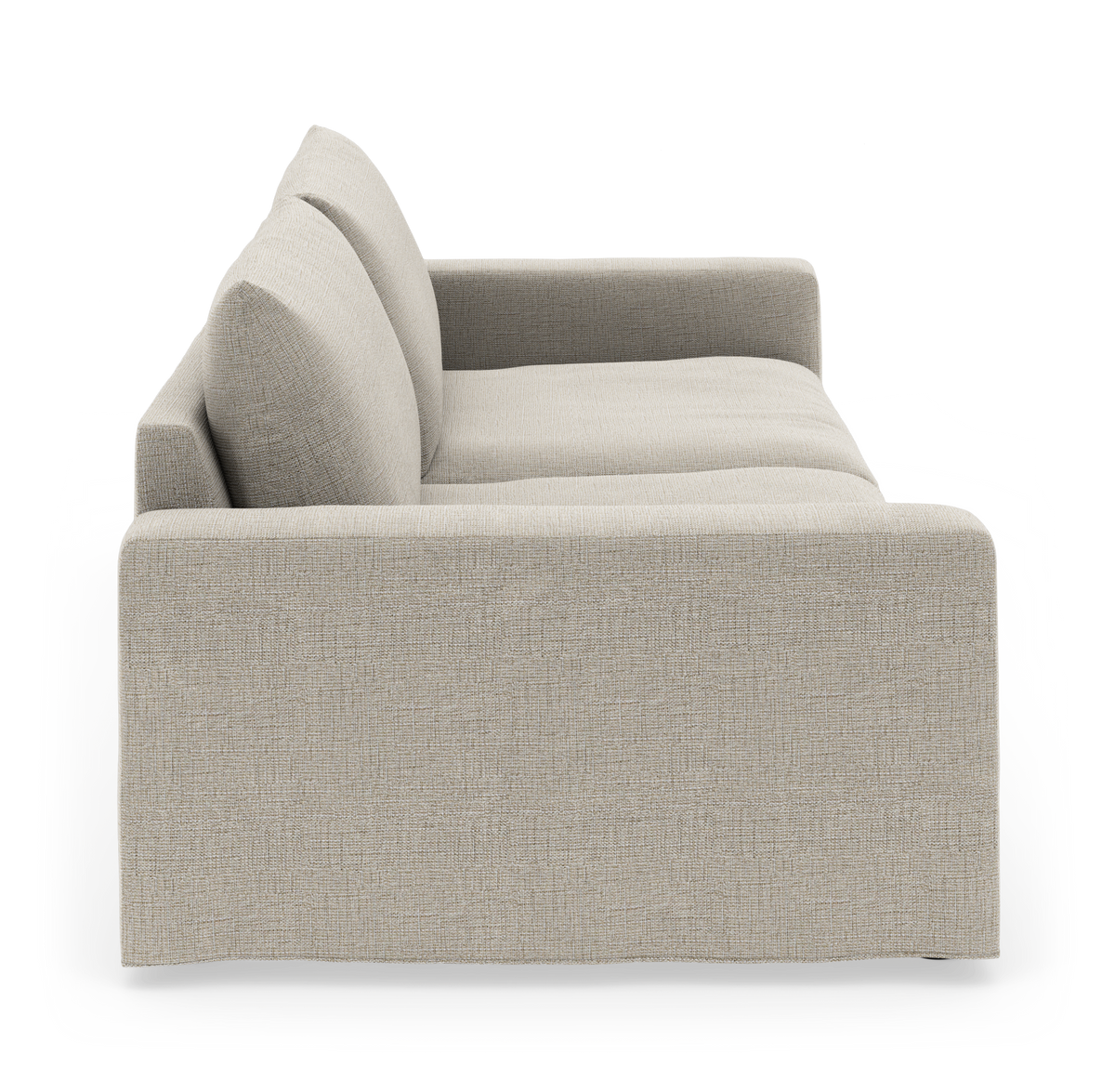 Beige stofsofa set fra siden, fritlagt på hvid baggrund.