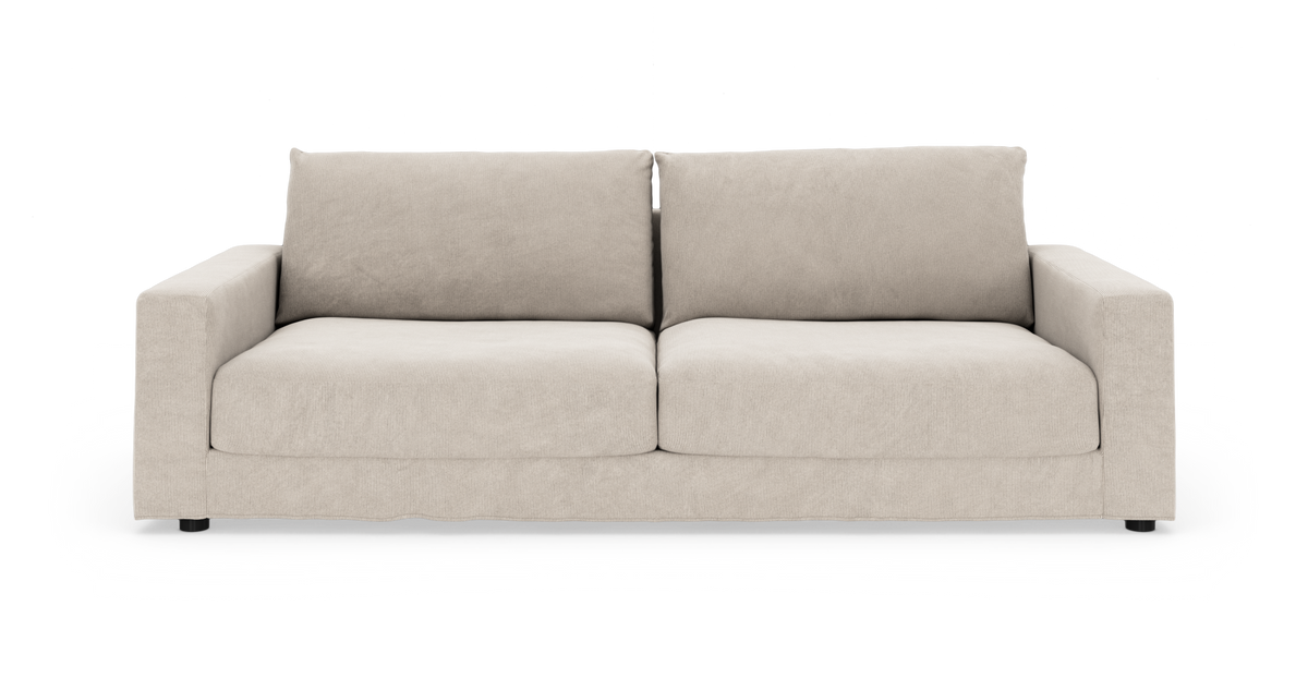 Beigefarvet 2-personers sofa med brede armlæn og to store ryghynder, frilagt på hvid baggrund.