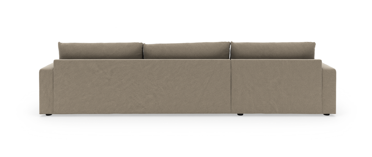Beige modulsofa set bagfra på hvid studiobaggrund.