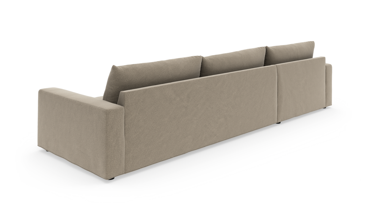 Beige modulsofa set bagfra på hvid baggrund.