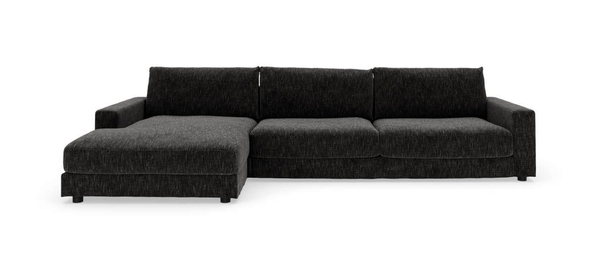 Mørkegrå hjørnesofa med venstre chaiselong, fritlagt på hvid baggrund.