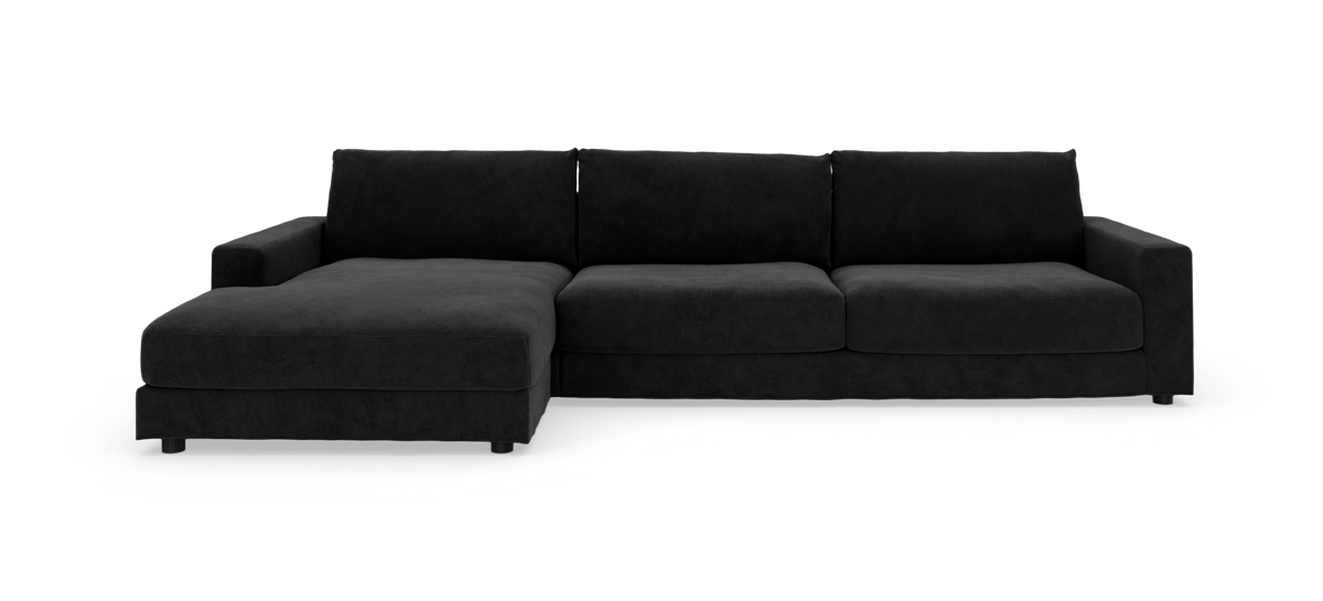 Sort modulsofa med venstre chaiselong, frontvisning på hvid studiobaggrund.