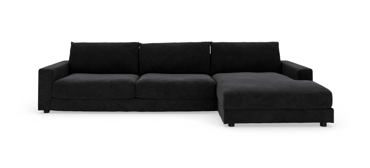 Sort modulsofa med højre chaiselong, set forfra.