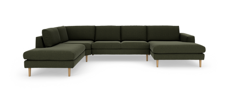 Modulsofa i mørkegrønt stof med træben, U‑formet sektionel, frilagt på hvid baggrund.