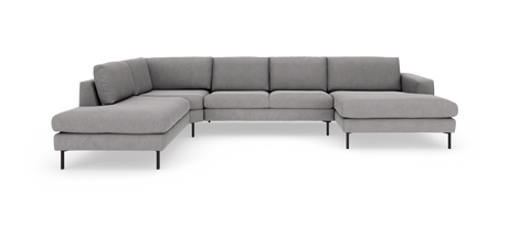 Grå L-formet modulsofa med slanke sorte ben, frilagt på hvid baggrund.