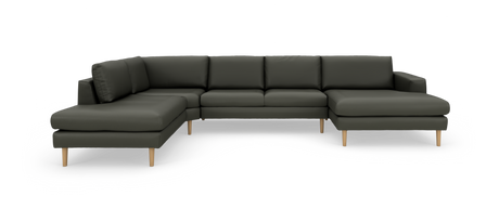 Mørkegrøn modulær U-sofa med træben, fotograferet i studie på hvid baggrund.