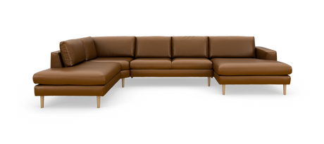 Brun L‑formet modulsofa i læder med træben, frilagt på hvid baggrund.