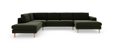 Mørkegrøn U‑formet hjørnesofa med lyse træben, fritlagt på hvid baggrund.