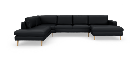 U-formet modulsofa i sort med to chaiselonger og lyse træben, fotograferet mod hvid baggrund.
