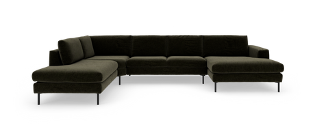 Mørkegrøn modulsofa i U‑form med to chaiselonger, fritstående på hvid baggrund.