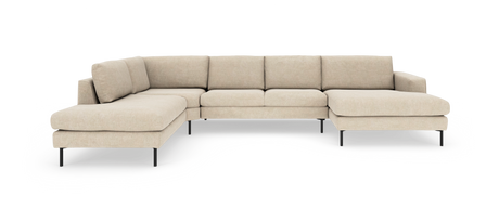 Beige L‑formet modulsofa med slanke sorte ben, frilagt på hvid baggrund.