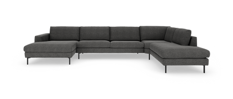 Mørkegrå modulsofa i U‑form med venstre og højre chaiselong, på slanke sorte metalben, fritlagt på hvid baggrund.