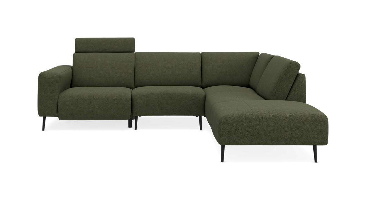 Grøn L‑sofa med chaiselong og justerbar nakkestøtte, fritlagt produktfoto.