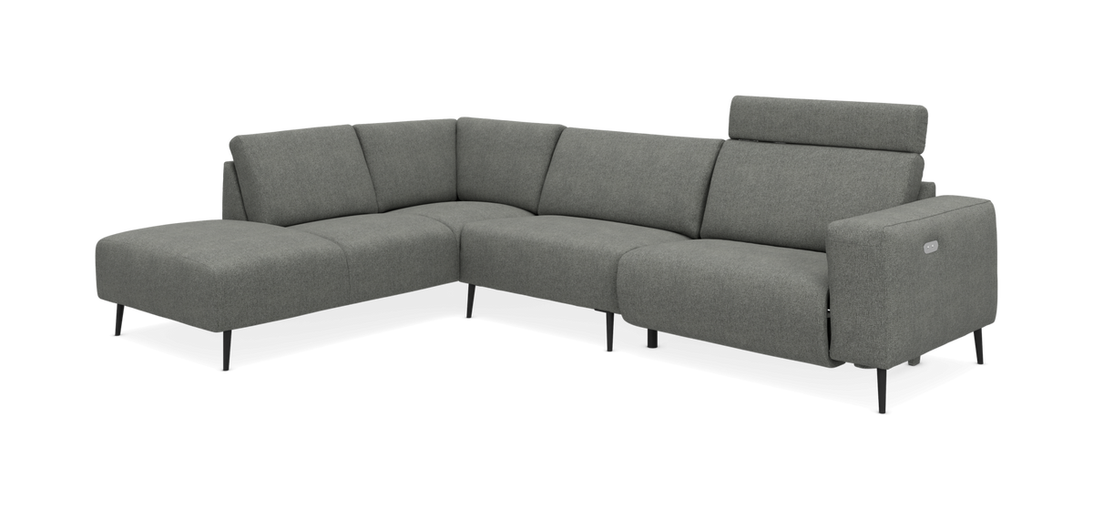 Grå L-formet modulsofa med chaiselong, justerbart nakkestøtte og sorte ben, produktfoto på hvid baggrund.