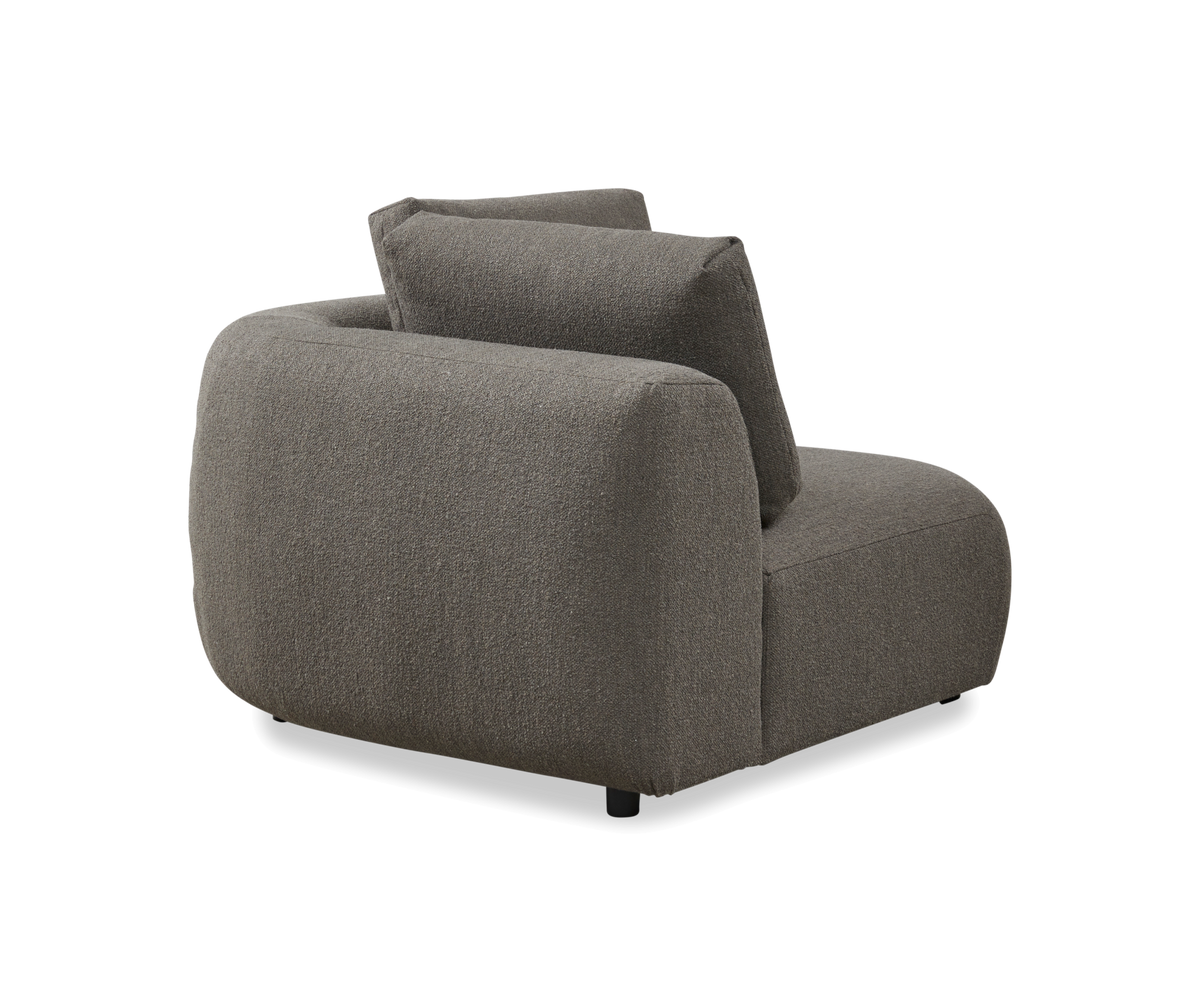 Grå modulsofa/lænestol med to ryghynder, set skråt bagfra.