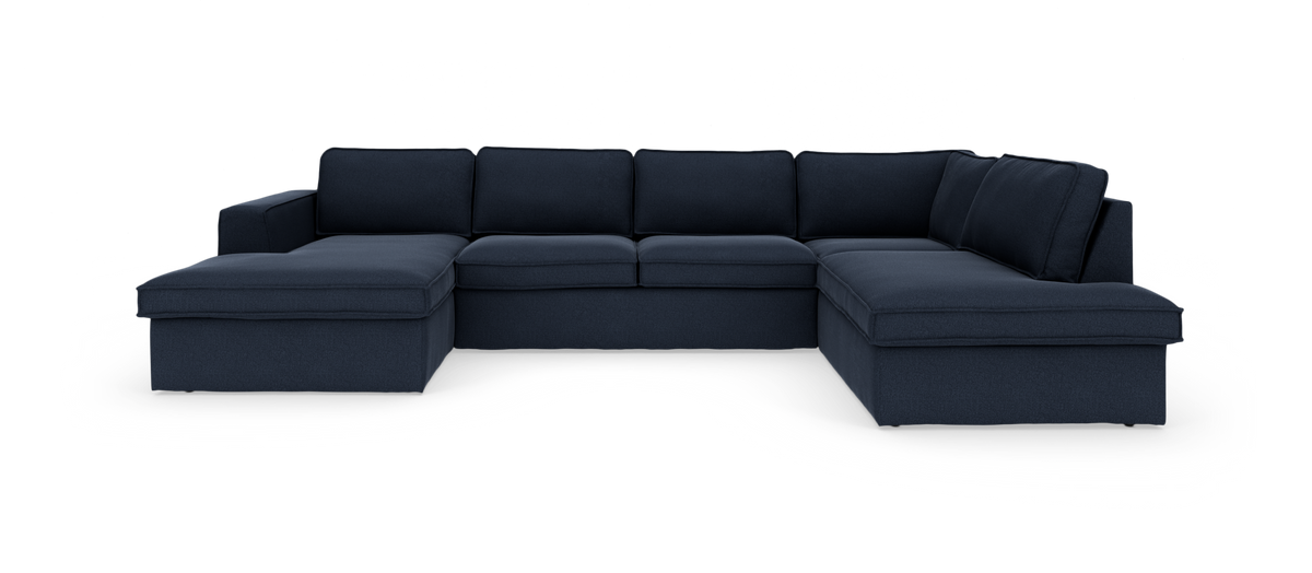 Mørkeblå U‑sofa med chaiselonger i begge ender, frilagt på hvid baggrund.